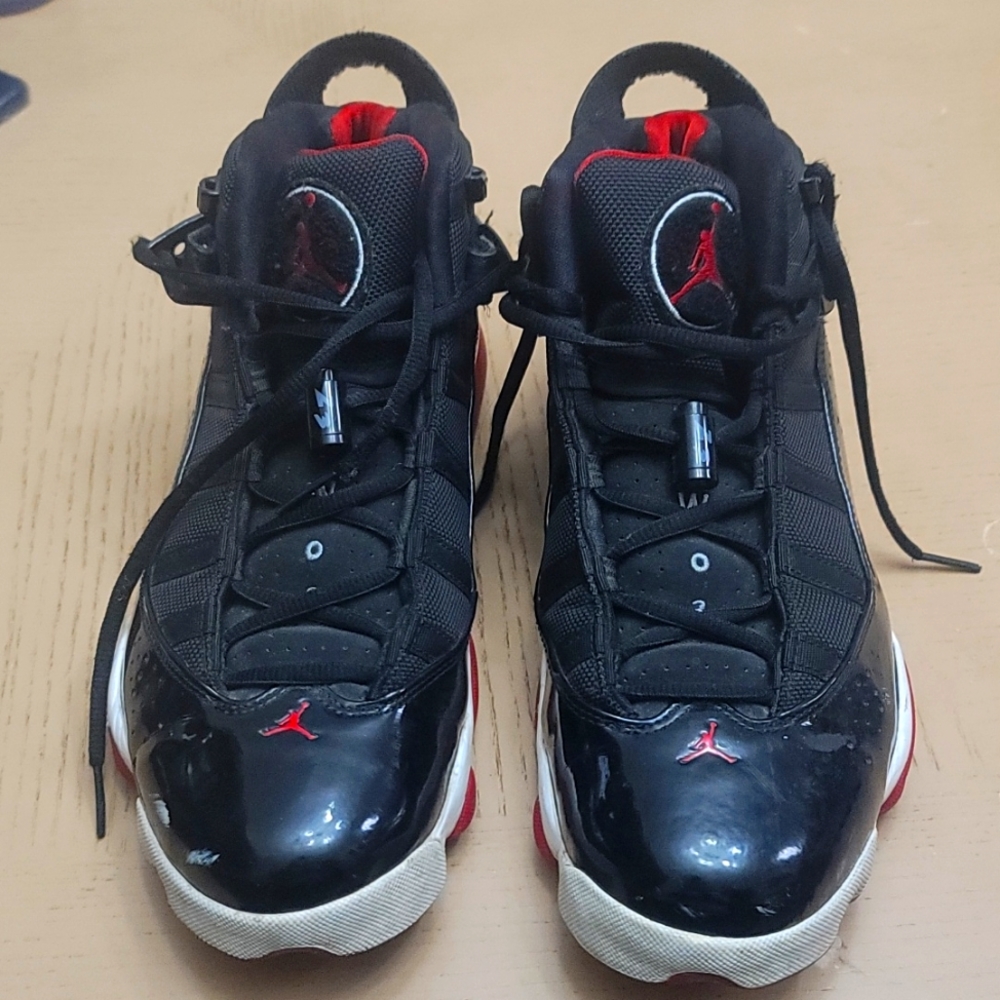 Red and black jordans